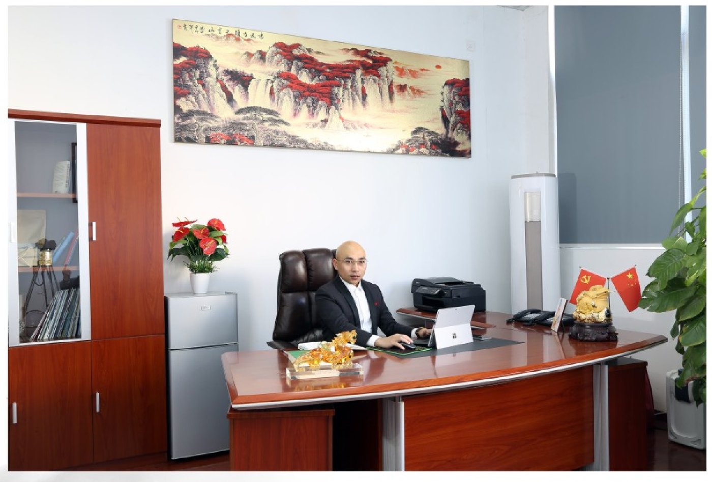 Boevan chairman at his desk